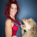 Santana Garrett Instagram - I WOOF you guys. 💙✨🐶 (Swipe to the last photo) 😂 #nationaldogday #dog #dogs #internationaldogday #daschund #goldendoodle Orlando, Florida