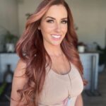 Santana Garrett Instagram - HAIR TRANSFORMATION 💁🏻‍♀️ Colorist/Stylist @masterpiecehair Hair Extensions @bohyme Drop a 🧡 below if you like it! ☺️ #haircolor #copper #redhair #hairtransformation #hair Moriah Brandon's Hair Salon
