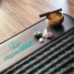 Sasha Clements Instagram - If you don't make time for your wellness you'll be forced to make time for your illness. Read that again✨⁠⁠ ⁠⁠ I just recently incorporated this [gifted] @higherdose PEMF infrared grounding mat in my wellness routine and it is everythingggg🤩 I use it to ease my chronic pain and promote my body's own recovery process. But it also helps to improve sleep, soothe the nervous system and just relax! I honestly haven't been this pumped to use a product in a while and use it multiple times a day!⁠⁠ ⁠⁠ Right now we're living in an apartment while we renovate our home. I'm not able to just walk outside barefoot and lay in the grass so this is a perfect substitute.⁠⁠ ⁠⁠ PEMF grounds you in earth’s magnetic field for a full-body reset, while Infrared’s deeply penetrating heat doubles the dose. PEMF waves are delivered in small bursts at a low-frequency, mimicking the same kind of electromagnetic waves you’d find in nature. ⁠⁠ ⁠⁠ Healing isn't linear. It's always moving in every direction. I have bad days and then days where I find a new normal. What's helped is finding ways that bring me back to center. Stretching, a mid day meditation, a wind down routine🧘🏻‍♀️⁠⁠ ⁠⁠ Have you tried a grounding mat?? What's the newest thing you've added to your wellness routine??⁠⁠ I'm always looking for new ways to heal!