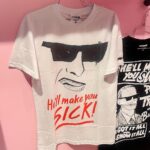 Seth Bogart Instagram - What an honor to design 3 collections of merchandise for the great new John Waters “Pope of Trash” show at @academymuseum ‼️ Seeing my art all huge on 2 walls at the end of the exhibit blew my mind. Love this pic @greggormanphoto took of John in front of my drawing of him. Just wait til you see the whole bathroom collection & the Divine/Pink Flamingos collection - both of those will be dropping sometime soon. Go see the show !!! Academy Museum of Motion Pictures