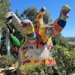 Seth Bogart Instagram - Bomarzo Gardens & Niki de Saint Phalle’s Tarot Garden 😭 When I approached the Tarot Garden it hit me so hard in a crazy way I was not expecting & was glad I had sunglasses on cuz I couldn’t stop crying!! Niki de Saint Phalle - wow wow wow - worked on it for almost 20 years and lived inside one of the sculptures (you can go in it- see my stories ). She was inspired by Bomarzo Gardens (which was made in 1552), where we went the day before. Glad I got to visit these places in this lifetime ❤️ Sacro Bosco di Bomarzo