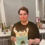 Shane Dawson Instagram - I call this photo series “PLEASE DON’T TURN THE CAKE AROUND I ALREADY F‼️KED IT UP”. Brought to you by my skills from childhood when I would carve out chunks of cake in the fridge and blame it on the RATS in the walls. Some things never change ❤️🎂🐾 ps. thanks for all the birthday love yesterday! It was the sweetest way to start out the year. I appreciate it so much :,))