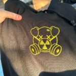 Shane Dawson Instagram - In memory of Doomsday💛⚠️🐷⭐️Feeling sad but also grateful. These are the merch items that were supposed to come out 2 years ago with the Doomsday Palette release. I never thought we were going to put them out but Mark at Killer Merch ordered some as a little memorial for the series and the palette. Looking at the pig mask idea and the Doomsday logo used to make me cry but now it makes me happy because it reminds me of this series which I’m so proud of. No pressure to get any of this merch but if you wanna rep the collection that we loved so much you can check it out in my bio💛