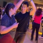 Shannon Kook Instagram - Finally diving into the Salsa social dancing floor, with the vibrant @abiforster24 💃🏻🕺🏻, at the 1st new weekly Salsaland Social. Thanks for capturing me unaware so I didn’t freeze knowing the camera was on me @waynitobaza 😆! And for the dance moves - loving your stuff m’dude 😎 Downtown Vancouver