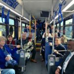 Sharice Davids Instagram - Me and my crew on the way to plug in new RideKC electric buses 😎 Federal funding passed in December will add up to 10 buses to the fleet. Better transit = stronger economy. Nice!