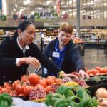 Sharice Davids Instagram - I can't represent #KS03 from behind a desk in D.C. That's why I love our #SharicesShift program! Today, I worked a grocery shift and spoke with Price Chopper employees and shoppers about what I'm doing to lower grocery costs for Kansans.