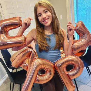Shaylee Mansfield Instagram - 14 YEARS OLD. Born as one of the biggest baby and now, you’re the smallest. But it’s not the actual size that matters, it’s the size of your spirit. A through and through Aries. You leave behind a trail of confetti from all of your party planning, food crumbs from cooking up a storm and baking sweets for others, giggles from your random jokes, and little notes of gratitude everywhere you go. When you give, it’s boundless.

It is without question that your youthful spirit, imagination, ray of optimism, and humor carry you far on your life journey. 

Wishing the brightest birthday to the one and only Shaylee Ava Mansfield. 🥖 🥐 🍟 🥟 🎢 🐶 ♈️🐘🎭🎉