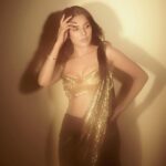 Shehnaaz Kaur Gill Instagram - Gold & Glitter ✨ Outfit @gauravguptaofficial Jewels @amarisbyprernarajpal MUAH @sachinmakeupartist1 @cheemabaljit2 📸 @gohil_jeet Managed by - @kaushal_j