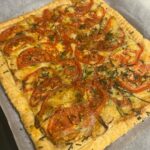 Shelly Horton Instagram - Oooh I made a tomato and brie tart to use up some of my home grown tomato crop. What a winner! I’m not a chef (I don’t even like cooking) but this is from Delish.com and the link is in my stories. Ingredients 1 sheet frozen puff pastry thawed 3 to 4 tomatoes, trimmed and sliced into thin half moons Salt 1/2 brie wheel, cut into thin slices 1 tbsp chopped chives Freshly ground black pepper Balsamic glaze and basil leaves, for serving Directions Step 1 Preheat oven to 200º. On a lightly floured surface, roll puff pastry Slide pastry onto a baking sheet. Using a fork crated a folded edge. Step 2 Meanwhile, sprinkle tomatoes all over with 1/2 teaspoon salt and arrange in a single layer on papers. Blot top of tomatoes with paper towels to remove as much moisture as possible. Step 3 Arrange brie evenly across puff pastry. Top brie with tomatoes. Sprinkle with chopped chives. Salt and pepper. Step 4 Bake until pastry is puffed and golden and cheese is melted, about 25 minutes. Step 5 Drizzle with balsamic glaze and top with basil.