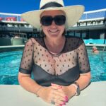 Shelly Horton Instagram - Cruising Life! Chilled pool day. Happy day. Wearing @caprioscaswimwear and @canopybay hat! Happy face all my own! Virgin Voyages