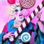 Sherry Pie Instagram - Mother Ginger is hot, sticky sweet from her head to her feet! 🍬🍭🍫 Art by Sweetie Pies #nutcracker #motherginger #sweet #candy #dessert #sherrypie #drag #queen #dragqueen #gay #queer #queerartist #lgbtq #holiday #christmas #blue #pink #makeup #photography #nyc #smile #sugar #fantasy #fun #eatit #campy #campclassic #holigay #magic #nutcrackerballet Land of Sweets