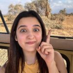 Shirley Setia Instagram - Matching colours with this cutie 😍🦒 #amboseli #amboselinationalpark #kenya #shirleytravels #safari Amboseli National Park, Kenya