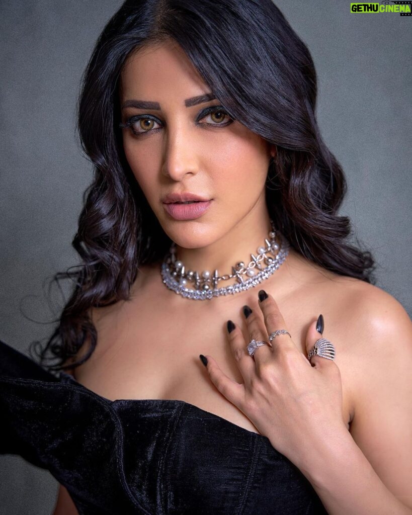 Shruti Haasan Instagram - Don’t let the gown fool you ☠️ . . . Styled by: @profanayty Assisted by: @whyshestyled Outfit : @johnandananth Jewelry: @ayanasilverjewellery @ascend.rohank Makeup: @george_p_kritikos @gpkritikos Hair: @noori_hairstylist Photographer: @akshay_26
