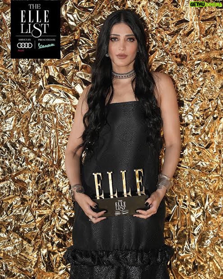 Shruti Haasan Instagram - I’m so thankful for those in this world who come here to build things but some of us are put here to break S#*T and patterns thankyou @elleindia for giving me the GAME CHANGER award at your #ellelist2023 event which was lovely .. really appreciate it 🖤🙏🧿 . . . Outfit @raw_mango, bag @aispi.co , jewellery @amrapalijewels , platforms @louboutinworld Styling @surbhishukla team @vedicavora @marisha.sanghvi Makeup @devikajodhani Hair @noori_hairstylist Photographer @akshay_26