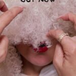 Sia Instagram - @arminvanbuuren’s remix of Gimme Love is out now, give it some love! 💝🎶🔊 - Team Sia [video description: the animated cover of Armin van Buuren’s remix of “Gimme Love” with Sia in a big, white wig and a color changing bow with the remix playing]