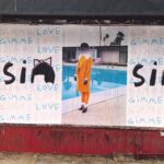 Sia Instagram - Spreading the love through LA! 🎬 Tag @siamusic if you see one in your city 💖 - Team Sia [video description: a person stepping over a Sia “Gimme Love” stencil on a sidewalk, panning up to posters of the “Gimme Love” and ‘Reasonable Woman’ art, set to the song “Gimme Love”]
