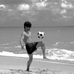 Siddharth Nigam Instagram – Beach boy🌧️✨ Doing some flipping 🤸🏻‍♂️ and dribbling ⚽️ 
@kayak_in ✨