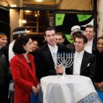 Sierra Boggess Instagram - The cast of @harmonyanewmusical celebrating Hanukkah outside the Barrymore Theatre with a menorah lighting, blessings and songs 🕎💙 Photos: Paul Aphisit