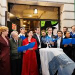 Sierra Boggess Instagram - The cast of @harmonyanewmusical celebrating Hanukkah outside the Barrymore Theatre with a menorah lighting, blessings and songs 🕎💙 Photos: Paul Aphisit