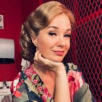Sierra Boggess Instagram - I told you I would tell you my reasons for doing @harmonyanewmusical And I saved the best for last. In the middle of my contract negotiations for Harmony, I went on my honeymoon to Nice, France. To be honest I was feeling dejected by how the negotiations were going and after being away from Broadway for 7 years I realized how much the landscape has changed and I was truly feeling sad that I may have to walk away from a show that has meant so much to me. One night in the middle of Vieux Nice (old nice) my husband took me to one of the oldest restaurants in the town called Chez Palmyre. At this restaurant you sit at long tables and so you’re sat shoulder to shoulder with other people, strangers really. Stefano and I struck up a conversation with the old couple next to us. The woman had a very thick accent and I couldn’t make out where she was from and she said her mother was from Poland and was a survivor. Stefano and I stared at each other in shock. She said her mother was in the Nazi camps and was forced to sew outfits for the nazis which is why she survived because she was of “use” to them. She was a seamstress by trade. Tears welled up in my eyes. For those that don’t know the show, Mary, my character is a seamstress. Her husband is from Poland. Tho she is not Jewish, she converts in order to be with him and I believe help him SURVIVE. I literally left the restaurant and text my agent and I said “I have to do this.” The work suddenly became bigger than any of the other. I felt like “Mary” sent an angel to me to say “please play me on Broadway”. And that is why tonight is about me bringing Mary her final time on Broadway. This is why I took the show and why, as hard as this has been, I have to do what I do. That’s why the last line of my bio is “For Mary Magdalena Panzram.” She gets to be on Broadway.