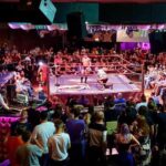 Simon Musk Instagram - I was sad to hear of the unfortunate demise of Preston’s Evoque nightclub last week and it turned me to reflect on a lot of brilliant memories I had there as part of Preston City Wrestling. I debuted for PCW on their first official show at Evoque and, being completely honest, the first few shows there felt underwhelming. The wrestling felt secondary, almost like it was background fodder for a night out. In December 2011 however, things clicked. Myself and 5 of my best friends at the time opened the Christmas show in a 6-Way and the atmosphere was fantastic. The crowds had started to recognise and resonate with a lot of the British wrestlers, most of us being relatively unknown at that point, an indication of the U.K. scene at the time. From that point onwards, PCW began to hit its stride and as wrestling began to catch fire across the country, Evoque became one of the hotbeds of the scene. Pretty much every single show was packed and so many of us were afforded these wonderful opportunities to wrestle some of the biggest names the independents had to offer. I credit my 2012 match with then-Dragon Gate star Akira Tozawa as being one of the key moments of my career, but I had a lot of moments in Evoque that I hold dear. I had matches with many that have gone on to big things. I wrestled The Young Bucks, ReDragon, Tommaso Ciampa, Ultimo Dragon, Adam Cole, Super Crazy and Juventud Guerrera. I wrestled Matt Hardy on an afternoon show 15 minutes after he showed up at the venue worse for wear from the night before, and I got absolutely battered by Low-Ki after he spent 3 hours explaining how wrestling worked to me. I got to see my friends absolutely kill it against big names, I got to see them get huge reactions and create incredible moments, with undoubtedly the pinnacle being Trav’s inspiring return from cancer. Evoque wasn’t just responsible for being part of a golden era for British wrestling, it was a place that helped us all grow as performers. I’ve no real involvement in wrestling anymore, but I’ll always be grateful for places like Evoque and PCW for what it gave to me.