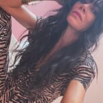 Simone Kessell Instagram - I fell down the stairs in selfie mode 🦓hair by @troysbrennan jumpsuit #vinnies ❣️