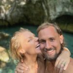 Sisse Marie Instagram – Happy Valentine’s Day! ♥️
I have to be honest; this day doesn’t normally hold a lot of meaning for me, but I love to love! So today, I want to share a little love story with you all. Back in 2021, I met Alexander in Los Angeles. Right from the beginning, it felt like we were supposed to meet. We are both from northern Denmark. Alexander is from a little village with fewer than 500 people. My family has a vacation house there, and I spend many summers in Blokhus. I grew up in another small village 30 minutes away. After a short while, we discovered that Alexander’s Onkel lives in my grandparents’ house where I spend so much time with my farmor and farfar. His other uncle created my first Album cover, banners for my first tour, etc., and the list goes on. We never met in Denmark! We ended up living together and were best friends for more than a year with no romantic interest (our stories might differ a little here) 😅. We were both going through a tough time and supported each other through the hardship. I guess Alexander somehow always knew that there was more to it than best friends, but I didn’t. He has told me later that it was the most patient he’s ever been.
One day, everything changed, and we were both ready for this adventure to unfold. We just got a new dream house and are expecting a baby girl. Alexander is the sweetest, most brainy, creative soul I have ever met. I feel so safe and seen. Never has a relationship been this easy. To wake up with your best friend who is just as crazy as you every day is a freaking miracle. For this to happen, we both had to learn to love and respect ourselves first. So grateful we both did that work.
I love you so much, Sander! ♥️ Thank you for being you!! The only bad thing is that I got my hick twang back when speaking Danish.
#love #valentines #denmark #couple #la