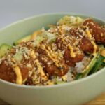 Solenn Heussaff Instagram - Whats for lunch? Presenting my Japanese inspired rice bowl for #unMeatMondays I love the savory, sweet, spicy and crunchy mix for this dish! Today using the @meetunmeat.ph nuggets for this dish. Sharing the ingredients below: Nugget sauce: - 1/4 cup coconut aminos - 1/4 cup rice vinegar - 1tbs sesame oil - 1 tbs sriracha - 2 green onions Cabbage slaw: - 1 green onions - 2 tbs tamari - 2 tbs rice vinegar - 1 tsp sesame oil - 1 tsp ginger - 1 tsp garlic - 2 cups shredded cabbage Spicy Mayo: - 5 tbs japanese mayo - 5 tbs sriracha Panko topping: - 1 tsp sesame oil - 1/2 cup panko - 1tsp garlic and onion powder Plating: Top rice with avos, cucumber, nuggets, panko topping, spicy mayo. #unBelievablyunMEAT