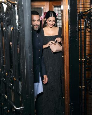 Sonam Kapoor Instagram - Date night with my baby in Versailles to one of the most beautiful dinners I’ve been too. Obviously in all @dior Also wearing this gorgeous bow from one of my favourite ribbon shops in London @vvrouleaux 

Make up @tanvichemburkar
Hair @peteburkill
Styling @nikhilmansata
Outfit @dior
Camera @dinesh_ahuja