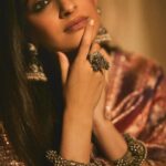 Sonam Kapoor Instagram - Wearing this @jigyam ensemble is what Indian textile dreams are made of! it’s my bffs wedding and this was the perfect chance for me to wear a beautiful outfit that was made from actual vintage old banarasee saree with real gold weave with all antique techniques of surface embroidery; they have added all vintage tassels with shells and pearls and the dupatta is embroidered with vintage mochi work pieces which are over 60 years old and is one of the finest techniques of embroidery from Gujarat. All the silver jewellery are actual antique pieces which have been collected over a period of time and payal and bangles are more then 80-90 years old antique pieces! Anand on the other hand is wearing gorgeous resham work kurta from @abujanisandeepkhosla which is a collectible heirloom. Each piece of theirs takes months to make. My jutti is @fizzygoblet and Anands is @rajeshpratapsinghworks 📸 @sheldon.santos #madeinindia #everydayphenomenal💫 #proudindian #textileheaven