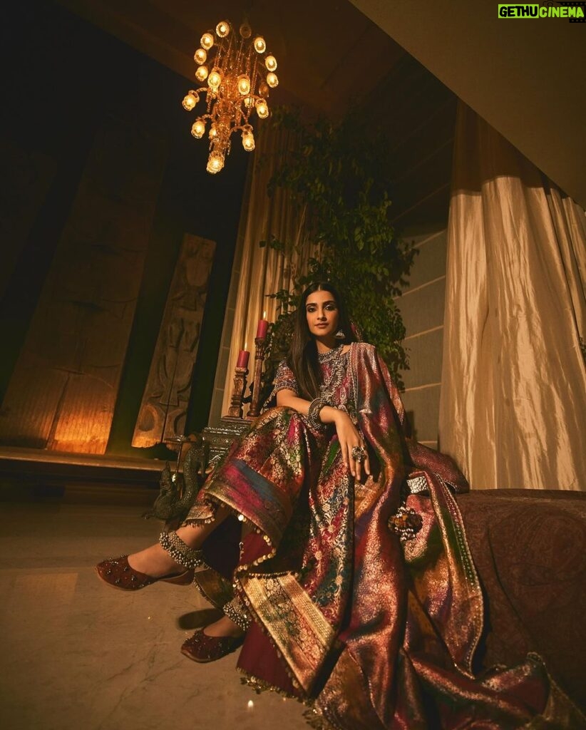 Sonam Kapoor Instagram - Wearing this @jigyam ensemble is what Indian textile dreams are made of! it’s my bffs wedding and this was the perfect chance for me to wear a beautiful outfit that was made from actual vintage old banarasee saree with real gold weave with all antique techniques of surface embroidery; they have added all vintage tassels with shells and pearls and the dupatta is embroidered with vintage mochi work pieces which are over 60 years old and is one of the finest techniques of embroidery from Gujarat. All the silver jewellery are actual antique pieces which have been collected over a period of time and payal and bangles are more then 80-90 years old antique pieces! Anand on the other hand is wearing gorgeous resham work kurta from @abujanisandeepkhosla which is a collectible heirloom. Each piece of theirs takes months to make. My jutti is @fizzygoblet and Anands is @rajeshpratapsinghworks 📸 @sheldon.santos #madeinindia #everydayphenomenal💫 #proudindian #textileheaven