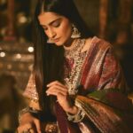 Sonam Kapoor Instagram – Wearing this @jigyam ensemble is what Indian textile dreams are made of!
it’s my bffs wedding and this was the perfect chance for me to wear a beautiful outfit that was made from actual vintage old banarasee  saree with real gold weave with all antique techniques of surface embroidery; they have added all vintage tassels with shells and pearls  and the dupatta is embroidered with vintage mochi work pieces which are over 60 years old and is one of the finest techniques of embroidery from Gujarat.
All the silver jewellery are actual antique pieces which have been collected over a period of time and payal and bangles are more then 80-90 years old antique pieces!

Anand on the other hand is wearing gorgeous resham work kurta  from @abujanisandeepkhosla which is a collectible heirloom. Each piece of theirs takes months to make.

My jutti is @fizzygoblet and Anands is @rajeshpratapsinghworks 

📸 @sheldon.santos 

#madeinindia #everydayphenomenal💫 #proudindian #textileheaven