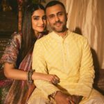 Sonam Kapoor Instagram - Wearing this @jigyam ensemble is what Indian textile dreams are made of! it’s my bffs wedding and this was the perfect chance for me to wear a beautiful outfit that was made from actual vintage old banarasee saree with real gold weave with all antique techniques of surface embroidery; they have added all vintage tassels with shells and pearls and the dupatta is embroidered with vintage mochi work pieces which are over 60 years old and is one of the finest techniques of embroidery from Gujarat. All the silver jewellery are actual antique pieces which have been collected over a period of time and payal and bangles are more then 80-90 years old antique pieces! Anand on the other hand is wearing gorgeous resham work kurta from @abujanisandeepkhosla which is a collectible heirloom. Each piece of theirs takes months to make. My jutti is @fizzygoblet and Anands is @rajeshpratapsinghworks 📸 @sheldon.santos #madeinindia #everydayphenomenal💫 #proudindian #textileheaven