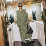 Sonam Kapoor Instagram - On my way to Wimbledon in style, donning a fabulous preview from Daniel Lee's resort 24 collection for @burberry and of course, I can't forget the latest addition to my wardrobe – the stunning Burberry knight bag from the new season. Game, set, match, and fashion-forward! Outfit @burberry Bag @burberry Sunglasses @burberry Earrings @otiumberg Styled by @rheakapoor Assisted by @prabhmalait Publicist @chandnimodha_ Hair by @aamirnaveedhair Make up by @gangamakeup Photographer @rowben_