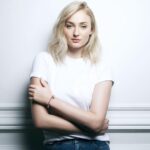 Sophie Turner Instagram - On #WorldChildrensDay it’s exciting for me to announce my collaboration with #LVforUNICEF to design a friendship bracelet. I want to explain the significance of the colors and also the charm that I designed. As we know, LV is known for being a brand all about travel and so the brands identity itself is important when collaborating with a charity that is prevalent all over the world. It’s all about bringing people together. I wanted my bracelet to hold luck for all the children whom the proceeds from this bracelet go to. So I wanted to integrate the idea of luck and also inclusion of many countries and cultures. I wanted to have the braids made of two colours; red and white. Red is considered a lucky colour in China. And the white coincides with my idea for having the little circular charm on the bracelet, a rabbit. A. Because WHITE rabbits are considered very lucky in the UK and a rabbit foot is considered lucky in many parts of Europe, China, Africa, North and South America. It also has a little bit of me on there because I have the same rabbit designed tattooed on my arm by @curtmontgomerytattoos #MAKEAPROMISE 🐰 ✈️ 🐇