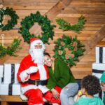Spencer Paysinger Instagram - Started wearing the suit for Cairos 1st Christmas and it’s turned into somewhat a tradition. Now that I’ve taken my talents to @findyourhilltop via @post21shop, I don’t see this tradition stopping any time soon. The joy [and legit fear] the kids came with is too good to miss! #OldSaintSpence.