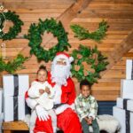 Spencer Paysinger Instagram - Started wearing the suit for Cairos 1st Christmas and it’s turned into somewhat a tradition. Now that I’ve taken my talents to @findyourhilltop via @post21shop, I don’t see this tradition stopping any time soon. The joy [and legit fear] the kids came with is too good to miss! #OldSaintSpence.