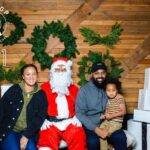 Spencer Paysinger Instagram - Started wearing the suit for Cairos 1st Christmas and it’s turned into somewhat a tradition. Now that I’ve taken my talents to @findyourhilltop via @post21shop, I don’t see this tradition stopping any time soon. The joy [and legit fear] the kids came with is too good to miss! #OldSaintSpence.