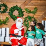 Spencer Paysinger Instagram - Started wearing the suit for Cairos 1st Christmas and it’s turned into somewhat a tradition. Now that I’ve taken my talents to @findyourhilltop via @post21shop, I don’t see this tradition stopping any time soon. The joy [and legit fear] the kids came with is too good to miss! #OldSaintSpence.