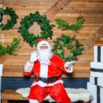 Spencer Paysinger Instagram - Started wearing the suit for Cairos 1st Christmas and it’s turned into somewhat a tradition. Now that I’ve taken my talents to @findyourhilltop via @post21shop, I don’t see this tradition stopping any time soon. The joy [and legit fear] the kids came with is too good to miss! #OldSaintSpence.