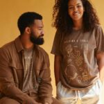Spencer Paysinger Instagram - I’ve had a front row, backstage, VIP packaged experience seeing @blairpysngr build @post21shop. More than 2 years ago while pregnant with Madden and Cairo hanging off her arm, she tells me she wants to build her own table out of frustration with not being able to support dope black owned businesses under one cohesive marketplace. Fast forward to now and @post21shop has 350 products across 75 vendors (and growing.) The launch of P21’s first T-shirt (designed by @blairpysngr herself) pays homage to those initial creatives who agreed to work with us. The back represents the spine of our company — the undying spirit of Black Wall Street. This shirt is a milestone for @post21shop, a celebration of its vendors, and a history lesson for those who believe Black Wall Street ended in 1921. Proud of you love! — P21’s 1st Assistant. LINK IN BIO to purchase.