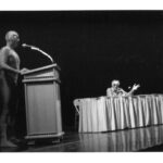 Stan Lee Instagram - Stan. Spidey. Center stage. 🤩 What a super symposium this must have been at the University of Wyoming in the early 1990s! What do you think the topic of conversation was? Tap the poll to vote on some of our frivolous thoughts! (Photo from the @ahcwyo) #StanLee #SpiderMan #WaybackWednesday