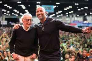 Stan Lee Instagram - Seeing stars 🤩✨ #tbt to that time Stan introduced @therock on stage at @comicconla in 2017! #StanLee