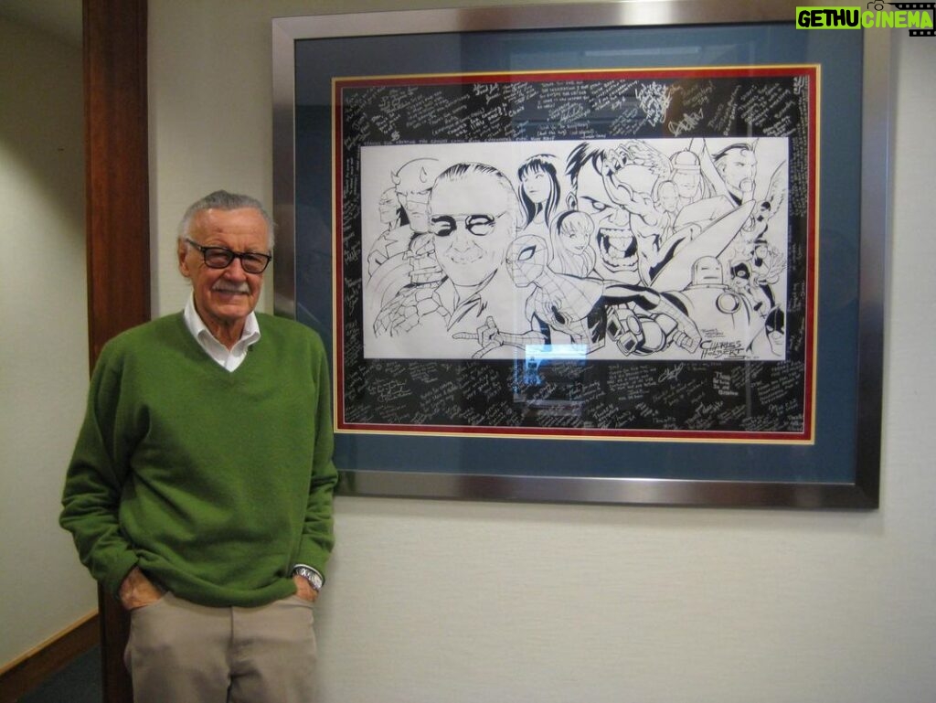 Stan Lee Instagram - Stan always admired artists, from those he worked closely with to the fans who created sensational Stan art. Here’s a flashback of him posing with a phenomenal piece crafted by Charles Holbert. #StanLee #WorldArtDay