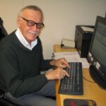 Stan Lee Instagram - Weekend throwback to Stan pioneering the work from home trend decades ago. 😂 When the weather was nice, he could sometimes be found clicking away on a trusty typewriter in his backyard, working on comics and his tan at the same time. Swipe to see Stan’s tried and true two-finger typing style, which he retained even after computers became the norm! #StanLee #WorldTypingDay