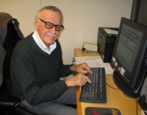 Stan Lee Instagram - Weekend throwback to Stan pioneering the work from home trend decades ago. 😂 When the weather was nice, he could sometimes be found clicking away on a trusty typewriter in his backyard, working on comics and his tan at the same time. 

Swipe to see Stan’s tried and true two-finger typing style, which he retained even after computers became the norm!
#StanLee #WorldTypingDay