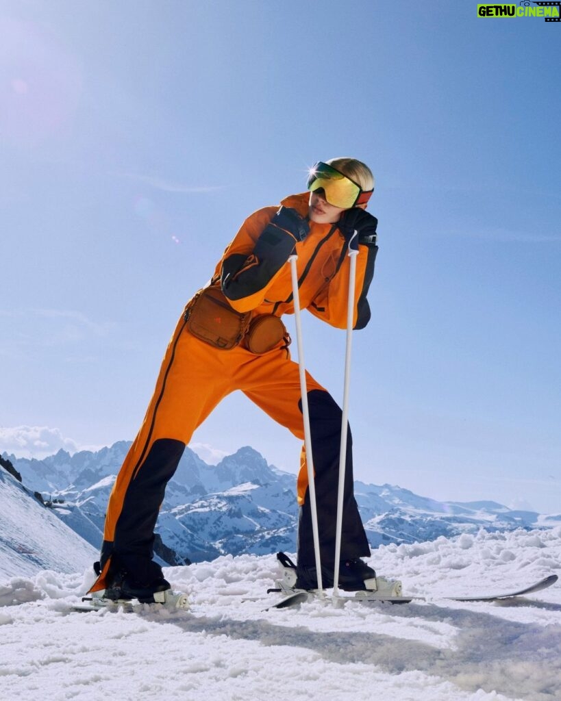 Stella McCartney Instagram - STELLA SKI: @lirisaw debuts our adidas by Stella McCartney skiwear collection, delivering power and performance. Crafted from recycled and renewable materials. Iris wears a jumpsuit crafted with Primaloft Parley insulation made from ocean plastics. Accessories include bags and gloves in recycled fibres, alongside anti-fog goggles powered by SP0053 KOLOR UP™ technology that adjusts lens colour in 30 seconds for optimum visibility, providing protection and comfort. Shop #adidasbyStellaMcCartney x TERREX skiwear at stellamccartney.com. #StellaMcCartney #adidas #adidasTERREX @adidasWomen @adidasTERREX