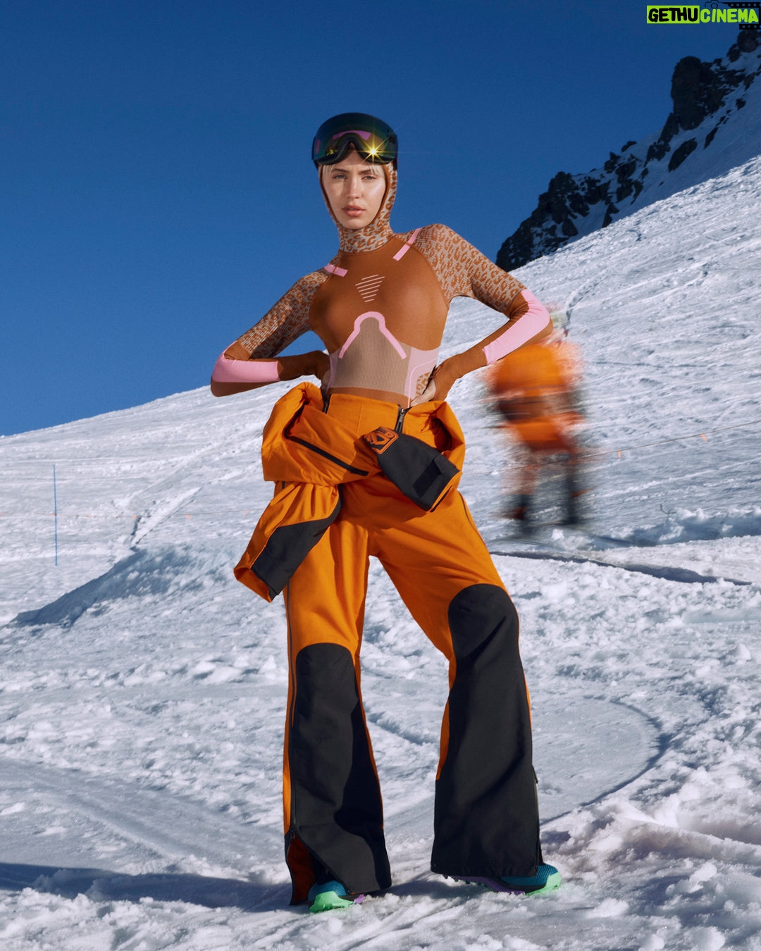 Stella McCartney Instagram - STELLA SKI: @lirisaw debuts our adidas by Stella McCartney skiwear collection, delivering power and performance. Crafted from recycled and renewable materials. Iris wears a jumpsuit crafted with Primaloft Parley insulation made from ocean plastics. Accessories include bags and gloves in recycled fibres, alongside anti-fog goggles powered by SP0053 KOLOR UP™ technology that adjusts lens colour in 30 seconds for optimum visibility, providing protection and comfort. Shop #adidasbyStellaMcCartney x TERREX skiwear at stellamccartney.com. #StellaMcCartney #adidas #adidasTERREX @adidasWomen @adidasTERREX
