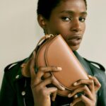 Stella McCartney Instagram - STELLA SUMMER: An apple a day. #Frayme bags are hand-stitched with corset lacing, crafted from UPPEAL™️ – a #vegan alternative to leather made of apple waste. Leftover apple pulp, skins and seeds that are otherwise sent to landfill or burned are recovered, dehydrated and ground into a powder which can substitute for oil and other fossil fuel derivatives in our luxury leather alternatives. Discover the #StellaSummer24 collection at stellamccartney.com. #StellaMcCartney #crueltyfree