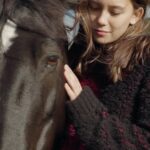 Stella McCartney Instagram – HEALING POWER OF HORSES: Ayamé describes how equine therapy has supported her #mentalhealth.
Ayamé is wearing #StellaWinter23 knitwear and trousers, shot at @OperationCentaur amongst the horses she received equine therapy from.
We have joined forces with @TheChopraFoundation’s @NeverAlone.Love to celebrate horses and their healing abilities, supporting teen mental health through #equinetherapy.
Discover more at healingpowerofhorses.com.
#StellaMcCartney #HealingPowerofHorses